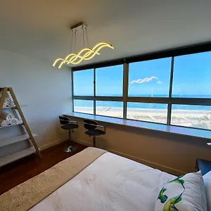 Front - Majestic Beachfront Haven *